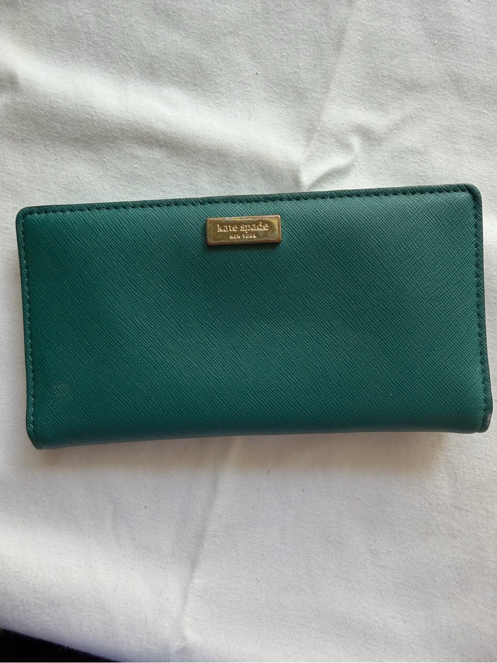 kate spade emerald green continental wallet with gold logo plaque